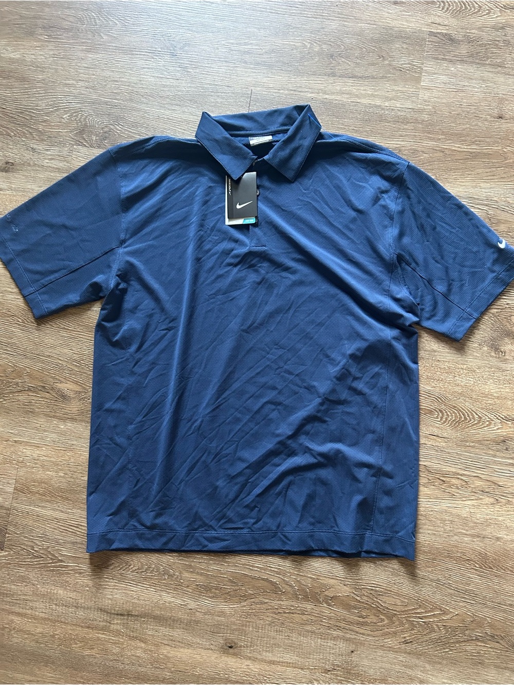 Nike Men's Navy Blue Polo Shirt with Swoosh Tag